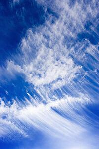 Blue sky with scattered clouds