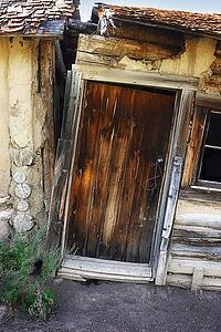 Abandoned house with door