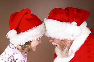 Profile of a girl with Santa Claus