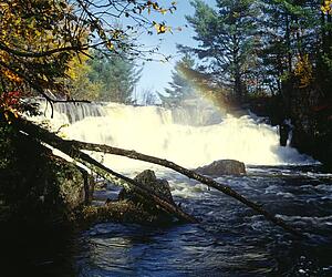 Rapids with rainbow, Quebec, Canada