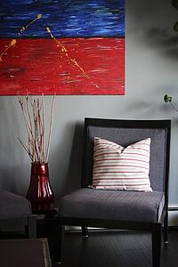 Chair with painting and vase