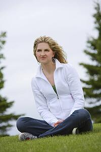 Woman sitting on lawn