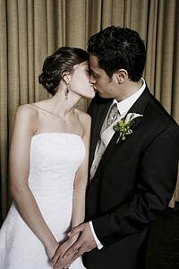Bride and groom kissing