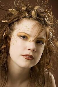 Woman dressed up as autumn