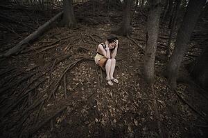 Woman alone in the forest