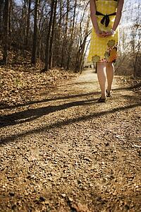 Female walking down a path