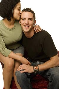 Woman kissing a man