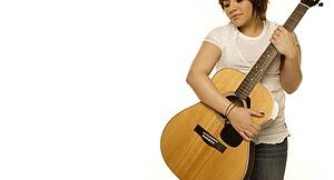 Woman holding a guitar