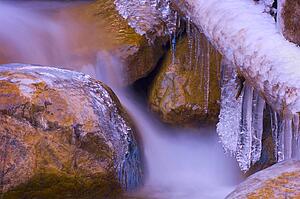 Ice build-up on river in Jasper National Park, Alberta