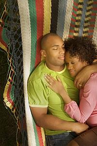 Husband and wife napping together