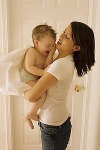 Mother holding boy