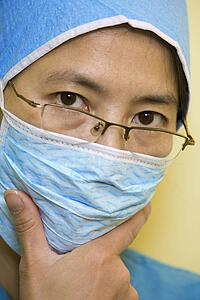 Portrait of surgeon thinking