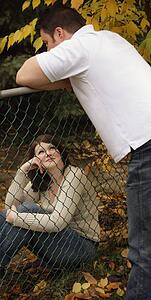 On the opposite sides of the fence