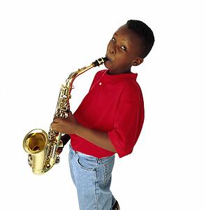Boy playing the saxophone
