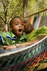 Father and son relaxing and laughing