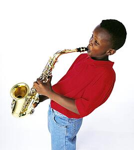 Boy playing the saxophone