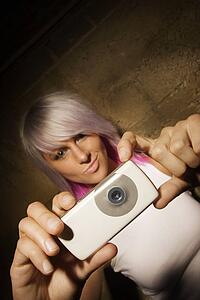 Woman with digital camera