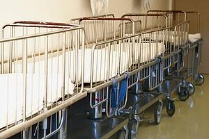 Pediatric hospital stretchers in hallway