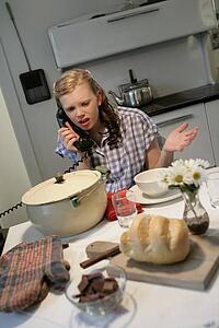 Woman in a 1940's style kitchen
