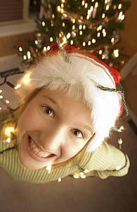 Teenager wearing a santa hat