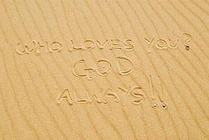 Writing in sand that states, "who loves you? GOD, always"