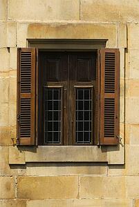 A window with shutters in Elorrio, The Basque Country, Spain