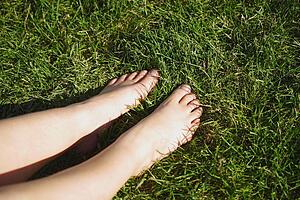 Bare feet on grass