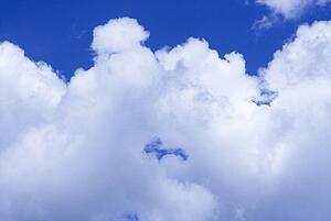 White clouds in a blue sky