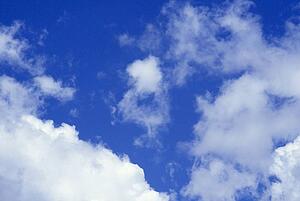 White clouds in a blue sky