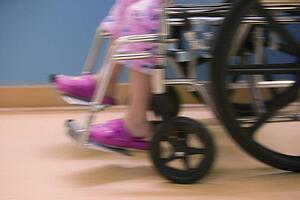 Child in hospital wheelchair