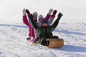 Children tobogganing