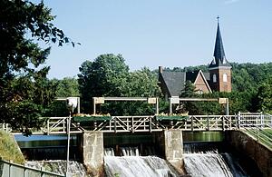 Church in background of a dam