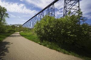 Road alongside a railway bridge in Lethbridge, Alberta