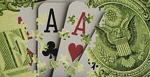Composite of a US dollar bill and playing cards