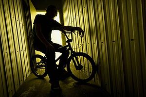 Person on a bike in a metal building
