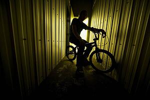 Person on a bike in a metal building
