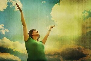Woman with arms raised