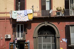 Laundry drying on veranda, Piazza Cavour, City of Naples, Italy
