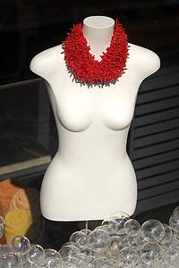 Mannequin in store window with bubbles