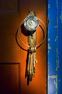 Antique glass doorknob with keys