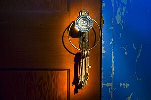 Antique glass doorknob with keys