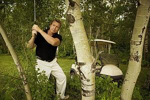 Man playing golf