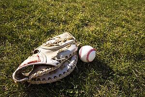 Baseball glove and ball