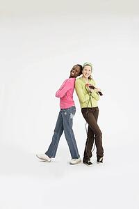 Girls standing with skipping rope