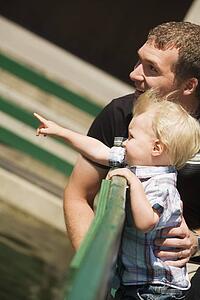 Side view of father with son