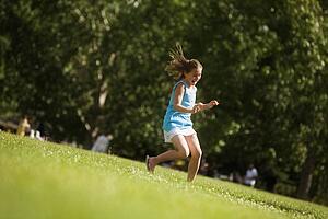 Girl running in the park