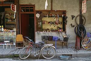 Bicycle in front of bicycle repair shop