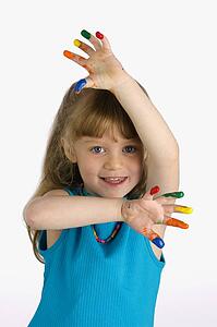 Girl with paint on her fingers