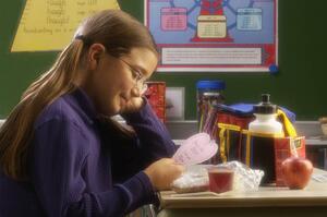Girl reading note