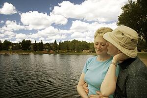 A couple by a lake